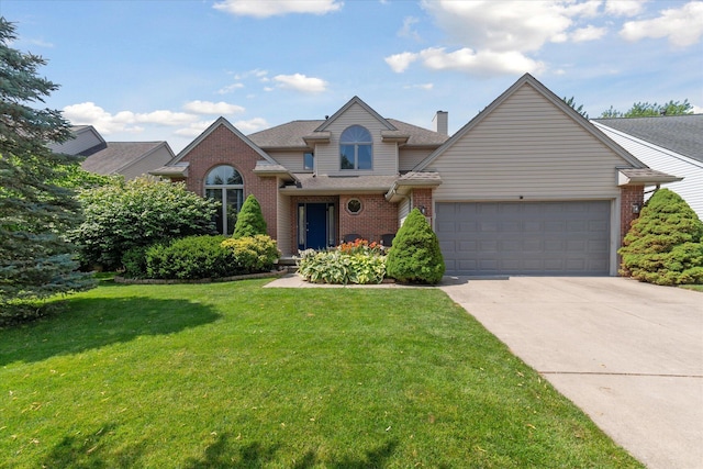 2388 Chestnut Cres, Saline, MI 48176 - traditional-style home with brick siding, driveway, an attached garage, and a front yard