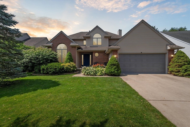 2388 Chestnut Cres, Saline, MI 48176 - traditional-style home featuring brick siding, driveway, an attached garage, a yard, and roof with shingles