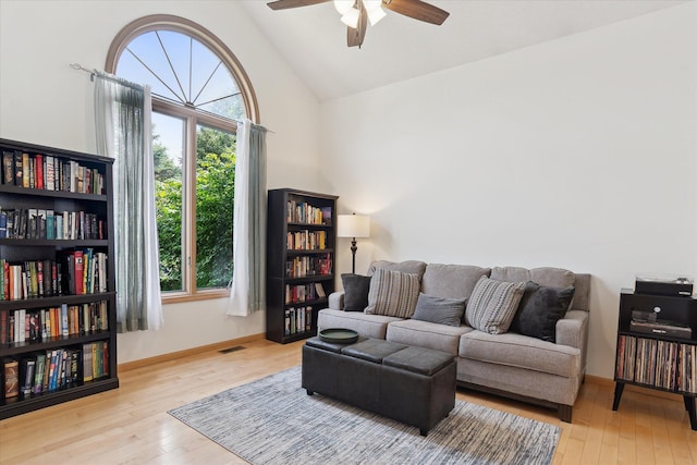 2388 Chestnut Cres, Saline, MI 48176 - living room featuring plenty of natural light, ceiling fan, hardwood / wood-style floors, and high vaulted ceiling