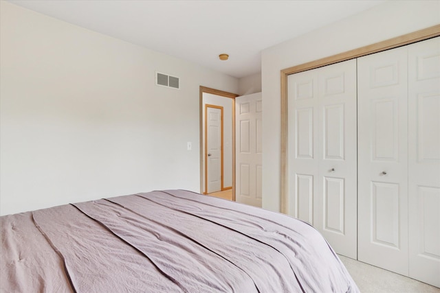 2388 Chestnut Cres, Saline, MI 48176 - bedroom featuring a closet and light colored carpet