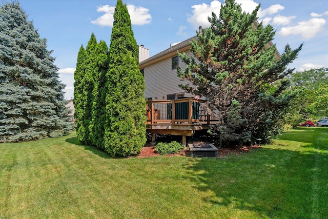 2388 Chestnut Cres, Saline, MI 48176 - view of grassy yard with a deck