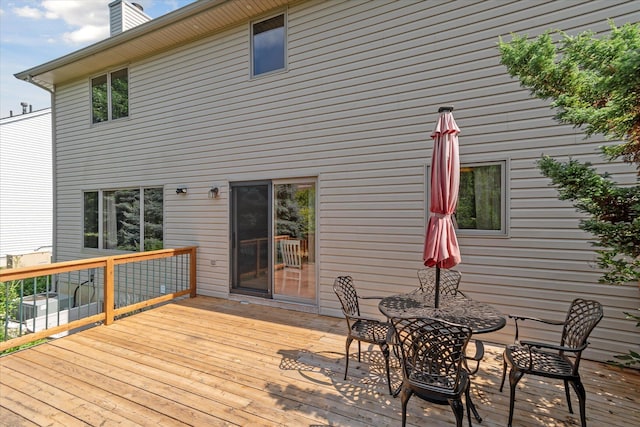 2388 Chestnut Cres, Saline, MI 48176 - deck featuring outdoor dining space