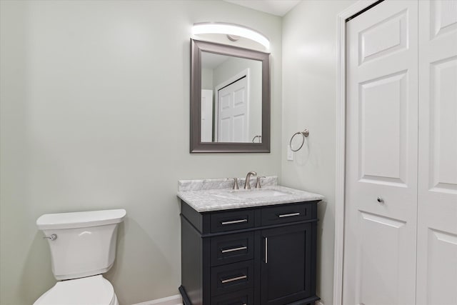 2388 Chestnut Cres, Saline, MI 48176 - bathroom featuring vanity and a closet