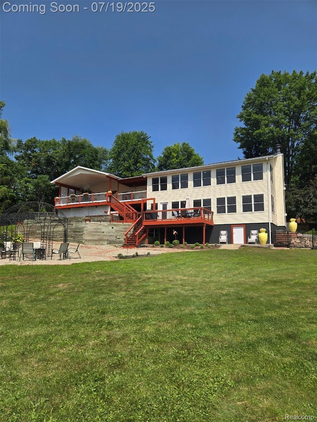 1236 White Lake Rd, Pleasant Lake, MI 49272 - rear view of property featuring stairway, a yard, and a deck