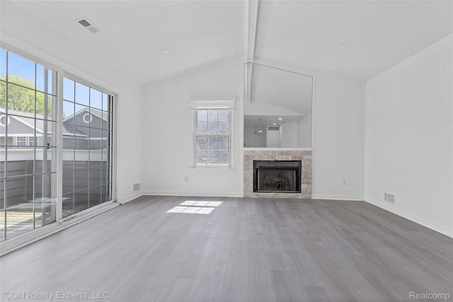6614 Embers Ct, West Bloomfield, MI 48322 - unfurnished living room featuring wood finished floors and a high end fireplace