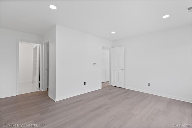 6614 Embers Ct, West Bloomfield, MI 48322 - unfurnished room with wood finished floors and recessed lighting
