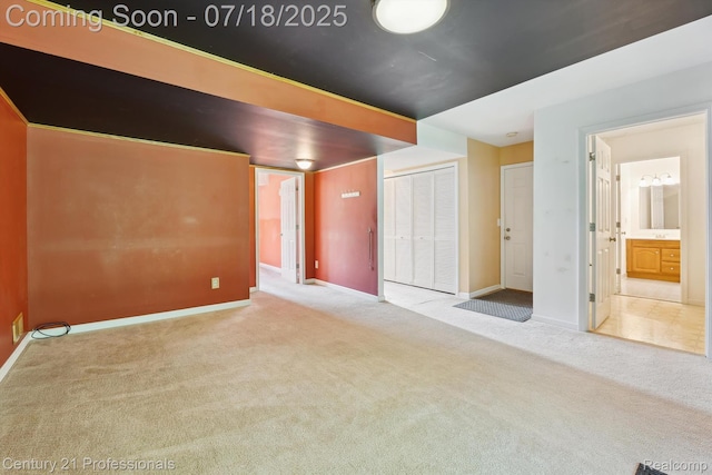 1605 N Hanlon St, Westland, MI 48185 - unfurnished bedroom featuring carpet floors, a closet, and ensuite bath