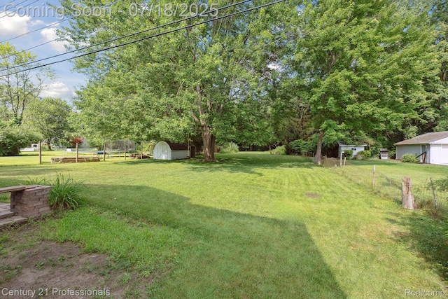 1605 N Hanlon St, Westland, MI 48185 - view of yard with a storage unit