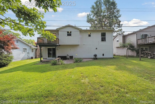 1605 N Hanlon St, Westland, MI 48185 - rear view of house with a lawn and a balcony