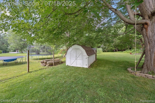 1605 N Hanlon St, Westland, MI 48185 - view of green lawn with a trampoline and a shed