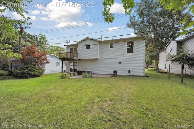 1605 N Hanlon St, Westland, MI 48185 - back of property featuring a yard, a patio area, and a balcony