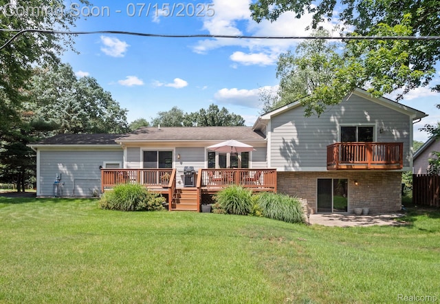 3290 Welch, Commerce Twp, MI 48390 - rear view of house with a lawn, a wooden deck, and a patio