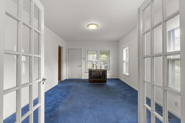 622 Tromley St, Inkster, MI 48141 - unfurnished living room featuring dark carpet