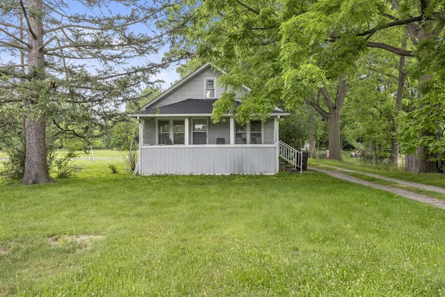 622 Tromley St, Inkster, MI 48141 - view of front of house featuring a front yard and roof with shingles
