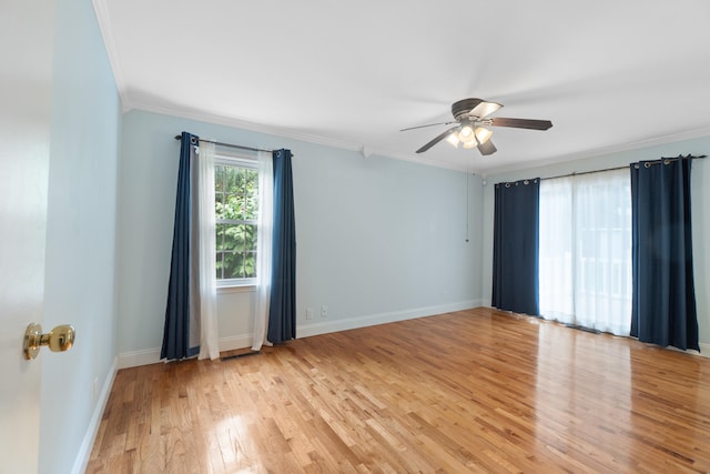 2113 Ridgeway Rd, Jackson, MI 49203 - unfurnished room featuring ornamental molding, a ceiling fan, and light wood-style flooring