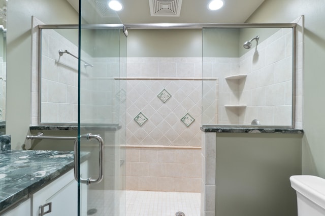 2113 Ridgeway Rd, Jackson, MI 49203 - full bath featuring vanity, a stall shower, and recessed lighting