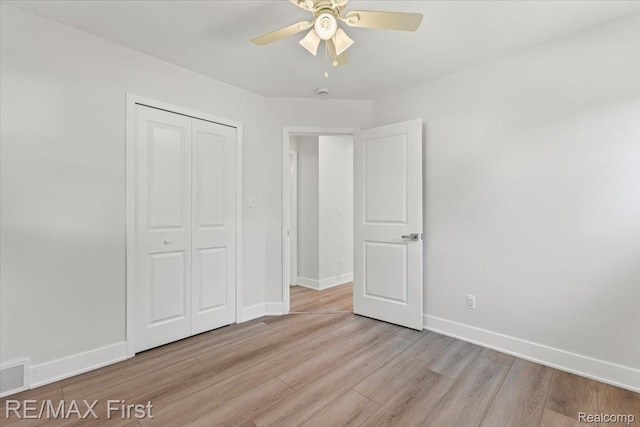 29924 Taylor St, Saint Clair Shores, MI 48082 - unfurnished bedroom featuring light wood finished floors, a closet, and ceiling fan