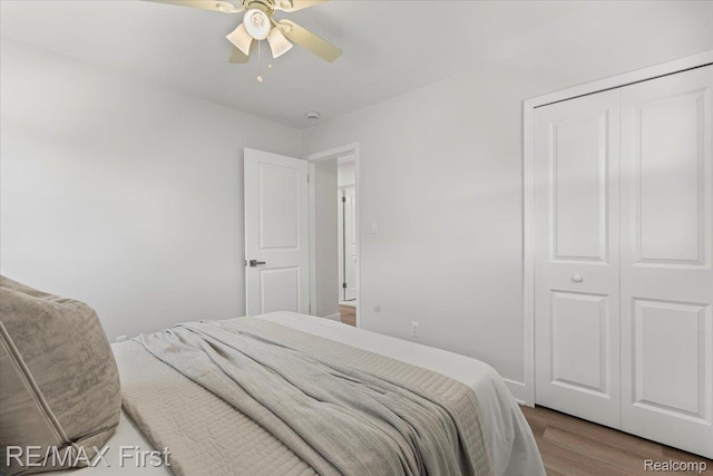 29924 Taylor St, Saint Clair Shores, MI 48082 - bedroom featuring wood finished floors, a ceiling fan, and a closet