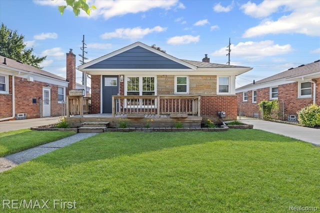 29924 Taylor St, Saint Clair Shores, MI 48082 - view of front of property with covered porch, a front lawn, a chimney, and brick siding