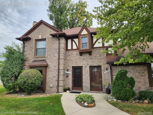 19370 W 11 Mile Rd, Lathrup Village, MI 48076 - tudor house featuring brick siding