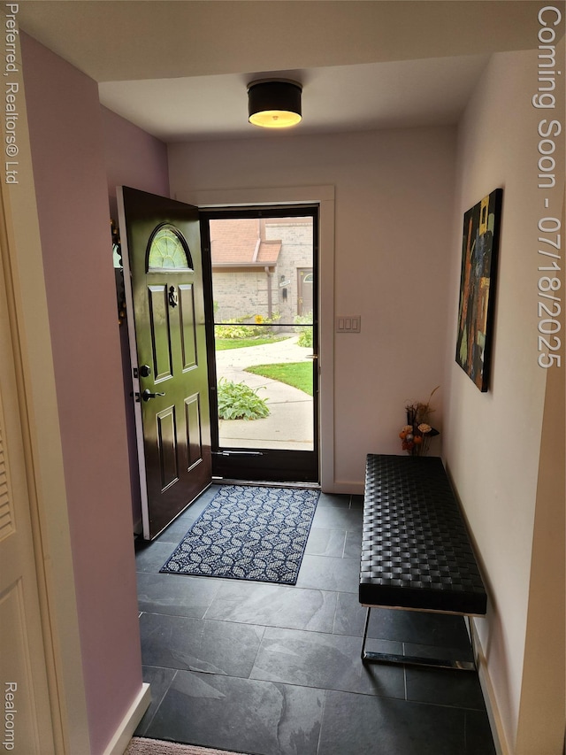 19370 W 11 Mile Rd, Lathrup Village, MI 48076 - foyer with baseboards and stone tile floors