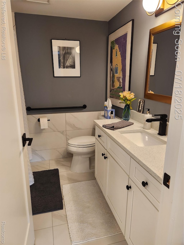 19370 W 11 Mile Rd, Lathrup Village, MI 48076 - bathroom with vanity, tile patterned floors, and tile walls