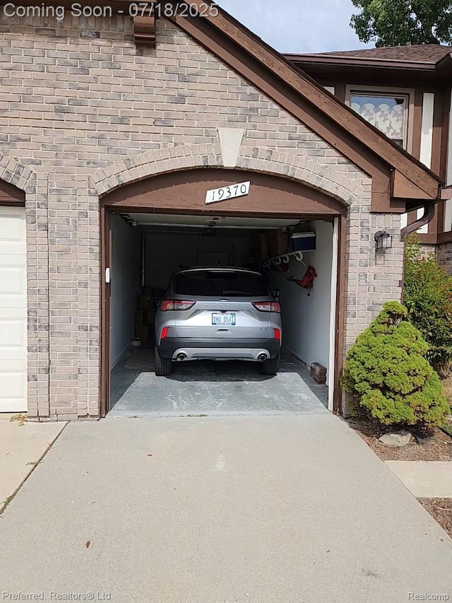 19370 W 11 Mile Rd, Lathrup Village, MI 48076 - garage with concrete driveway