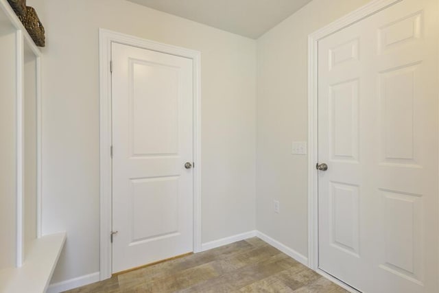 LOT107 Butternut Dr, Wayland, MI 49348 - hallway with light wood-type flooring and baseboards