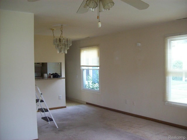2968 Elmwood Ct, Lake Orion, MI 48360 - spare room with plenty of natural light, light carpet, and ceiling fan
