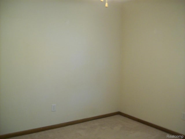 2968 Elmwood Ct, Lake Orion, MI 48360 - unfurnished room with light carpet and baseboards