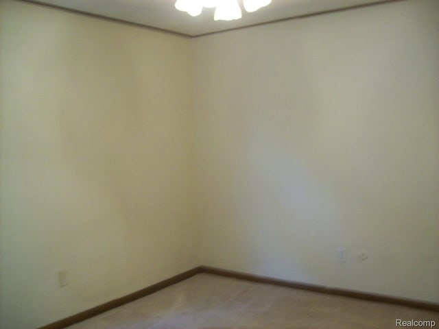 2968 Elmwood Ct, Lake Orion, MI 48360 - unfurnished room featuring light carpet and baseboards