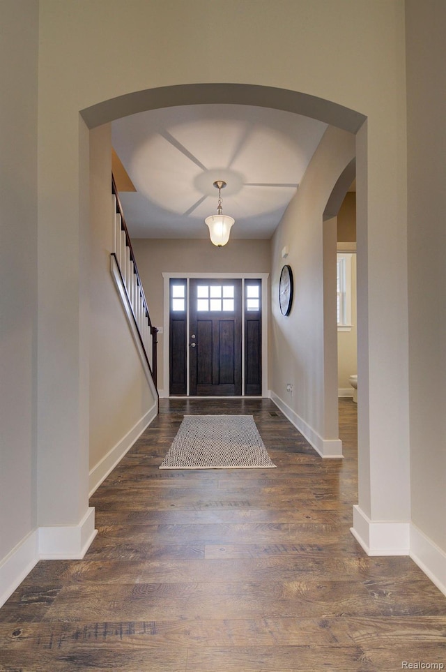MOH45 Birkdale Dr Unit 45, Howell, MI 48843 - foyer featuring arched walkways, wood finished floors, and stairway