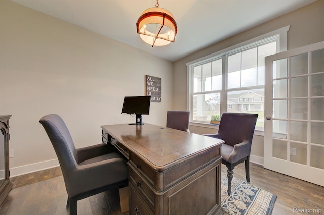 MOH45 Birkdale Dr Unit 45, Howell, MI 48843 - home office featuring plenty of natural light and dark wood finished floors