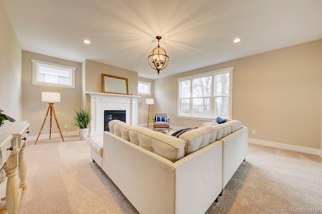 MOH45 Birkdale Dr Unit 45, Howell, MI 48843 - living area featuring light carpet, a brick fireplace, recessed lighting, and a chandelier