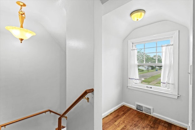 21197 Nummer St, Warren, MI 48089 - hall featuring an upstairs landing, wood finished floors, and lofted ceiling