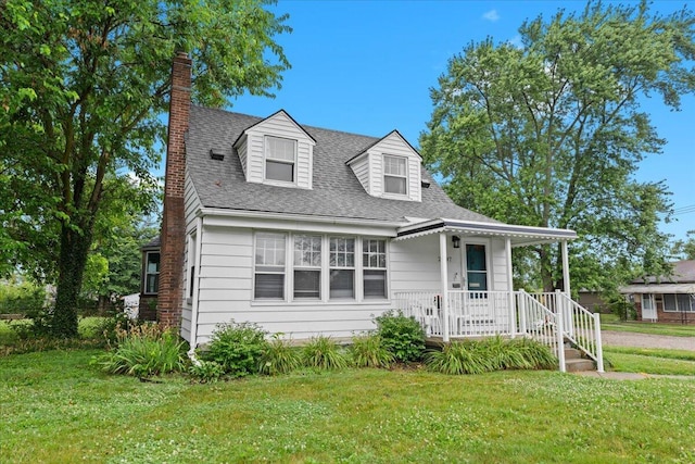21197 Nummer St, Warren, MI 48089 - cape cod house featuring a front yard, a chimney, and a shingled roof