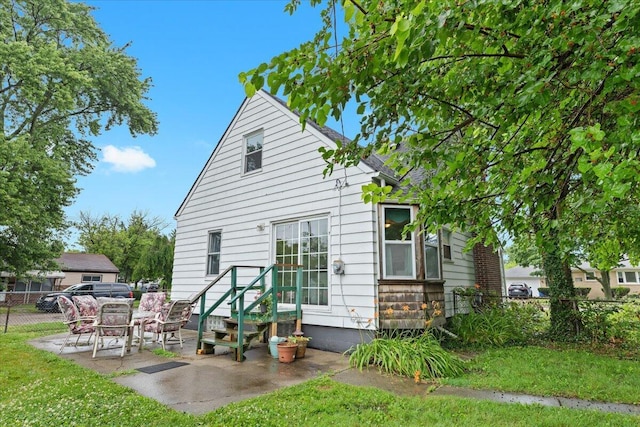 21197 Nummer St, Warren, MI 48089 - rear view of house featuring a patio area