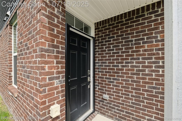 765 Hummingbird Dr, Rochester Hills, MI 48307 - entrance to property featuring brick siding