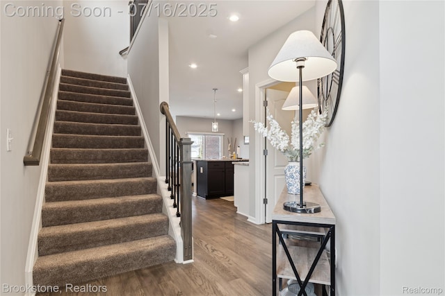 765 Hummingbird Dr, Rochester Hills, MI 48307 - staircase featuring wood finished floors and recessed lighting