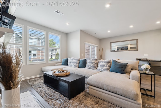 765 Hummingbird Dr, Rochester Hills, MI 48307 - living area with recessed lighting and wood finished floors