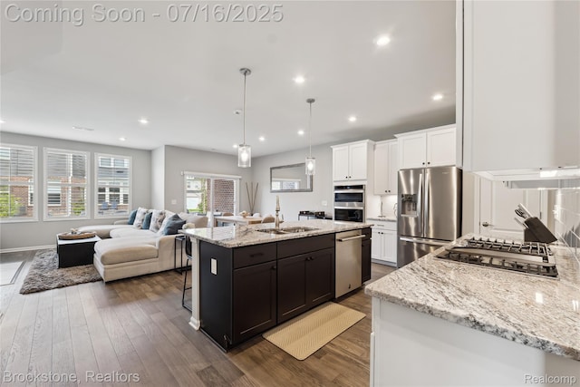 765 Hummingbird Dr, Rochester Hills, MI 48307 - kitchen featuring stainless steel appliances, dark wood finished floors, white cabinetry, open floor plan, and recessed lighting