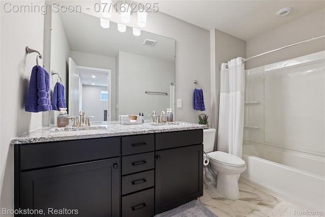 765 Hummingbird Dr, Rochester Hills, MI 48307 - bathroom featuring double vanity, shower / bath combo with shower curtain, and marble finish floors