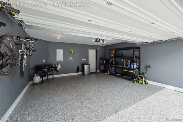 765 Hummingbird Dr, Rochester Hills, MI 48307 - garage with a garage door opener and electric panel