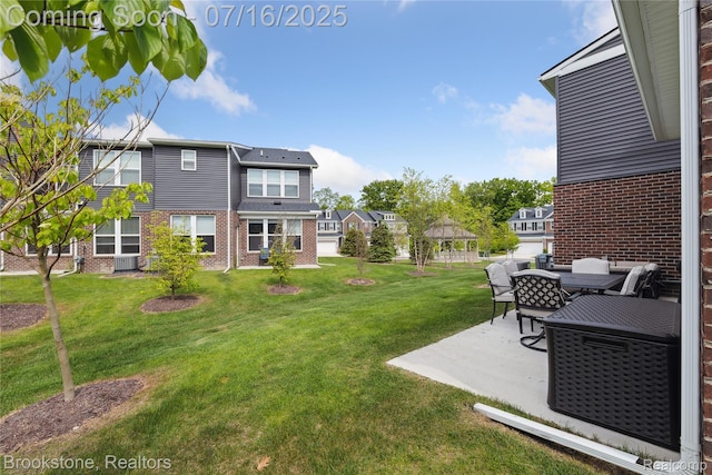 765 Hummingbird Dr, Rochester Hills, MI 48307 - view of grassy yard featuring a gazebo and a patio