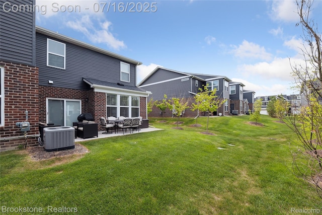 765 Hummingbird Dr, Rochester Hills, MI 48307 - view of grassy yard with outdoor lounge area and a patio area