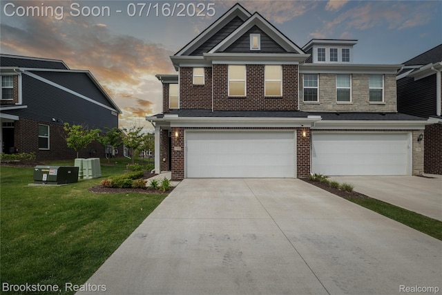 765 Hummingbird Dr, Rochester Hills, MI 48307 - traditional-style house with a front yard, driveway, brick siding, and a garage