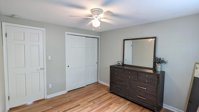 20519 Mauer St, Saint Clair Shores, MI 48080 - bedroom with light wood-style flooring, a closet, and a ceiling fan