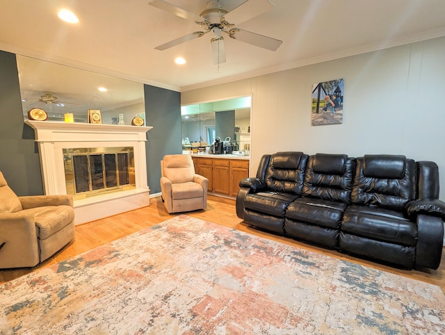 20519 Mauer St, Saint Clair Shores, MI 48080 - living room with a ceiling fan, crown molding, light wood-type flooring, a glass covered fireplace, and recessed lighting
