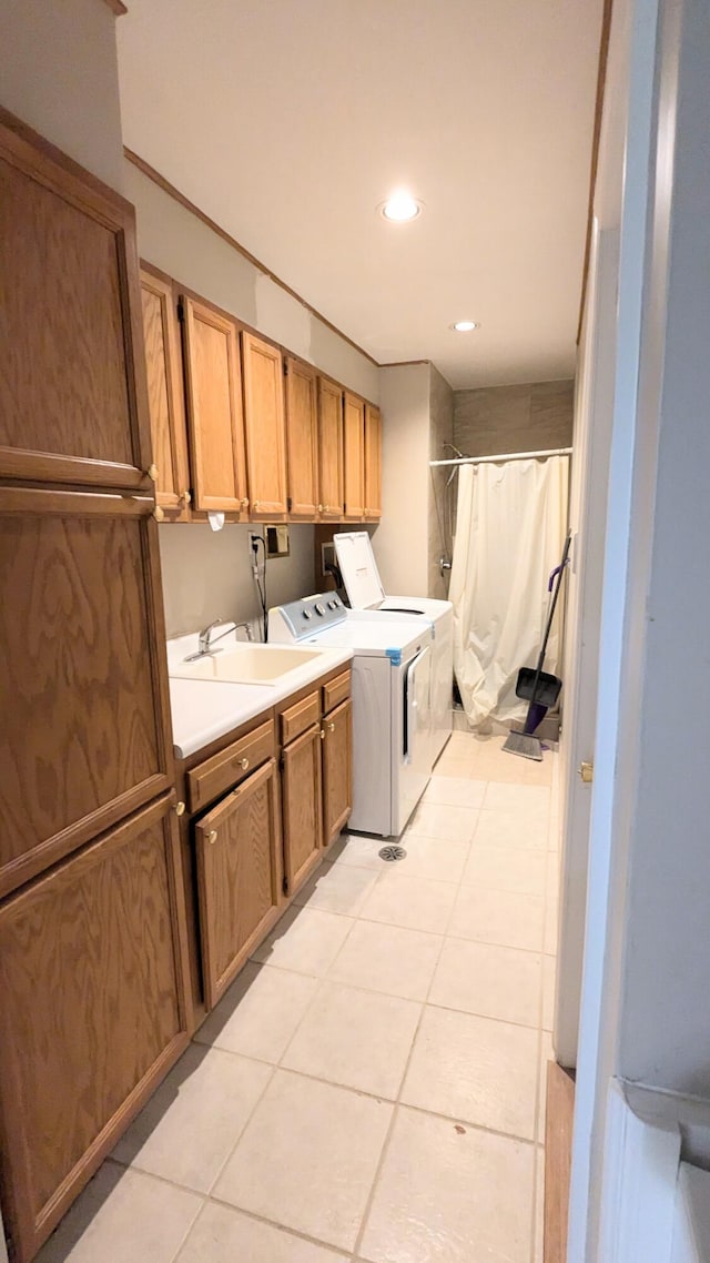 20519 Mauer St, Saint Clair Shores, MI 48080 - washroom with washing machine and clothes dryer, cabinet space, light tile patterned flooring, and recessed lighting