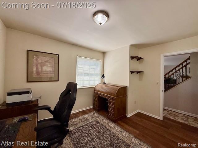 8354 Ridge Rd, Goodrich, MI 48438 - office space featuring dark wood-type flooring and baseboards